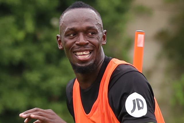 Usain Bolt watched Manchester City beat Chelsea 2-0 in the WSL (Isabel Infantes/PA)