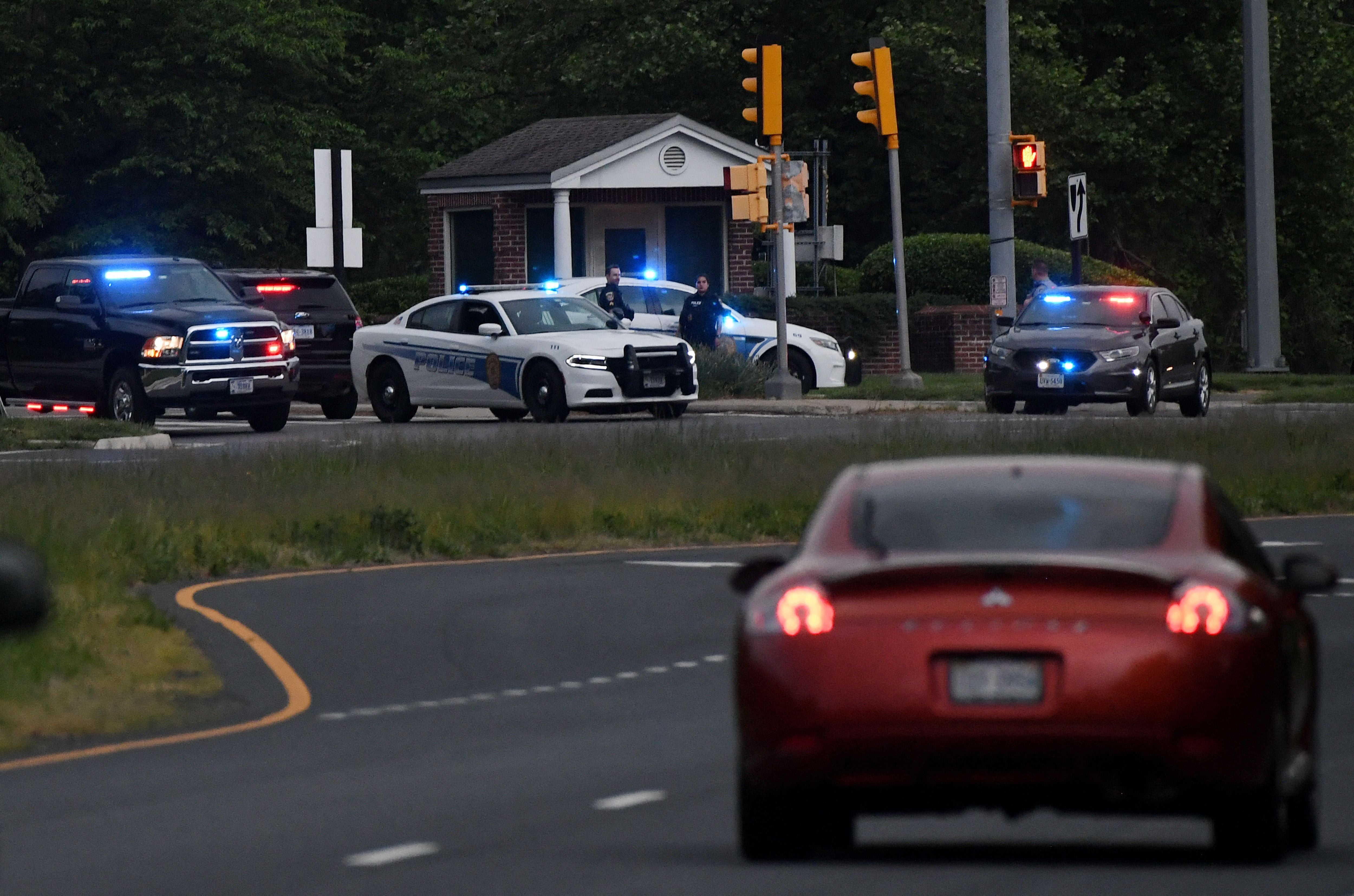 <p>Police cars in Virginia on 3 May 2021</p>