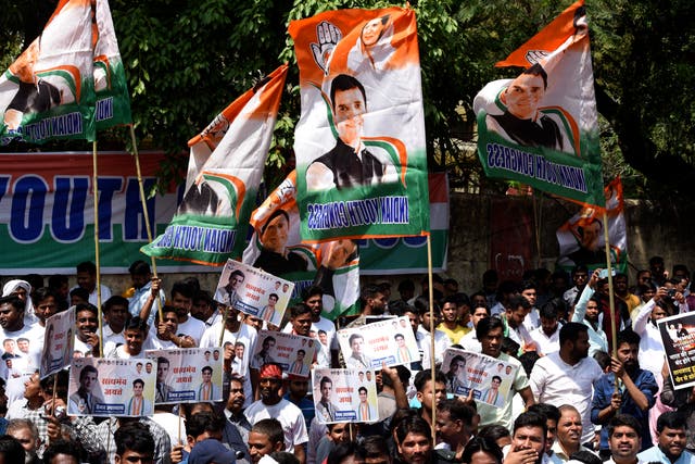<p>Supporters of opposition Congress party shout slogans as they protest against their leader Rahul Gandhi’s expulsion from parliament</p>