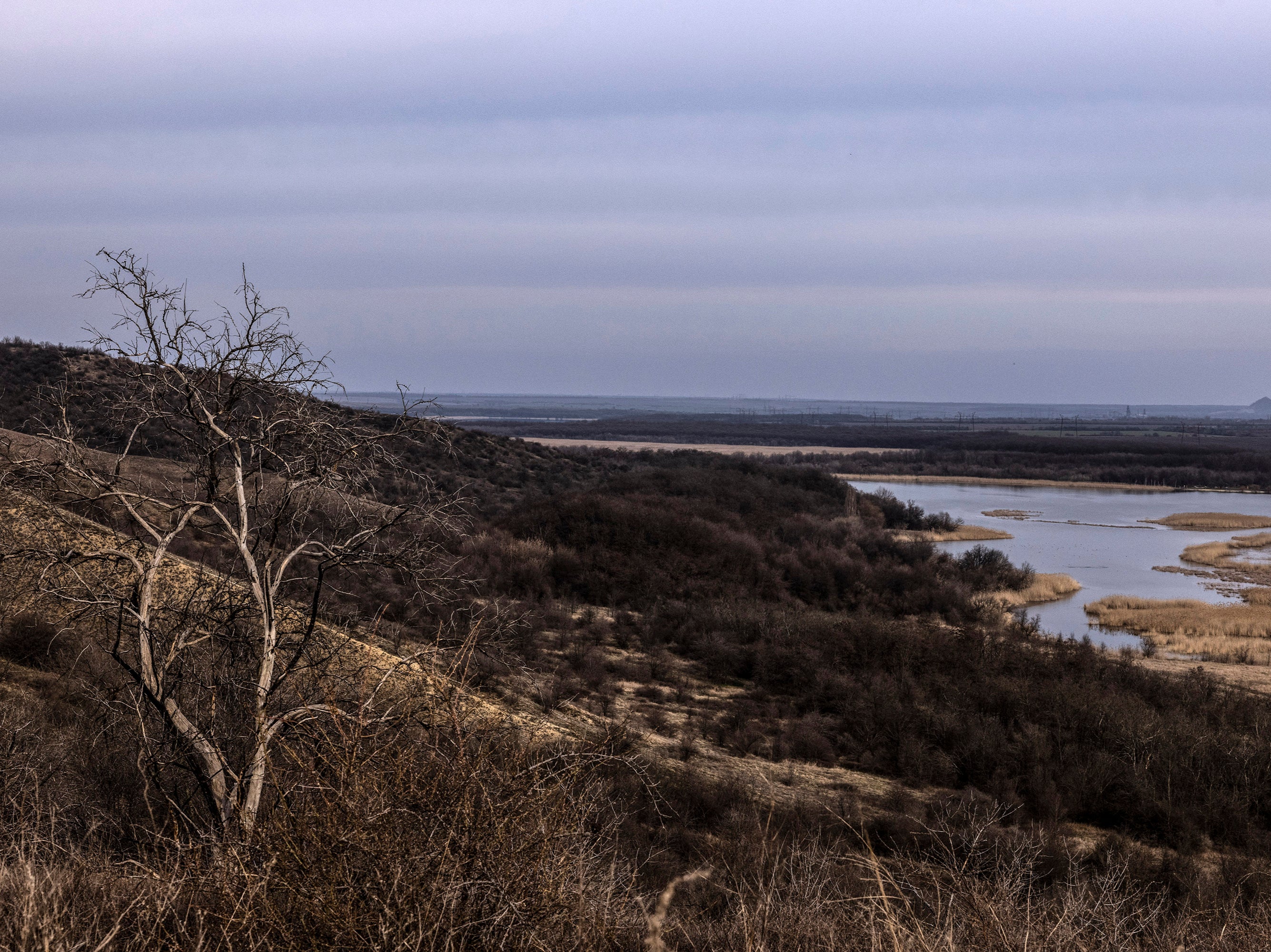 The rolling hills of the Donetsk region provide ample cover for invading Russian troops to manoeuvre without being seen until they attack