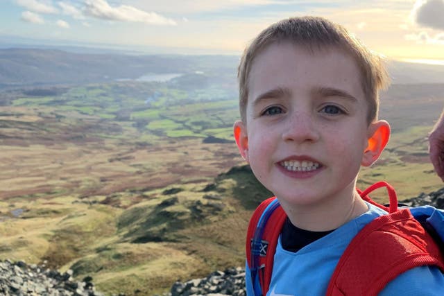 A six-year-old taking on 12 of the UK’s highest mountains for a children’s hospice said a ?10,000 donation from a member of the public was a “brilliant surprise” (Matt Burrow/PA)