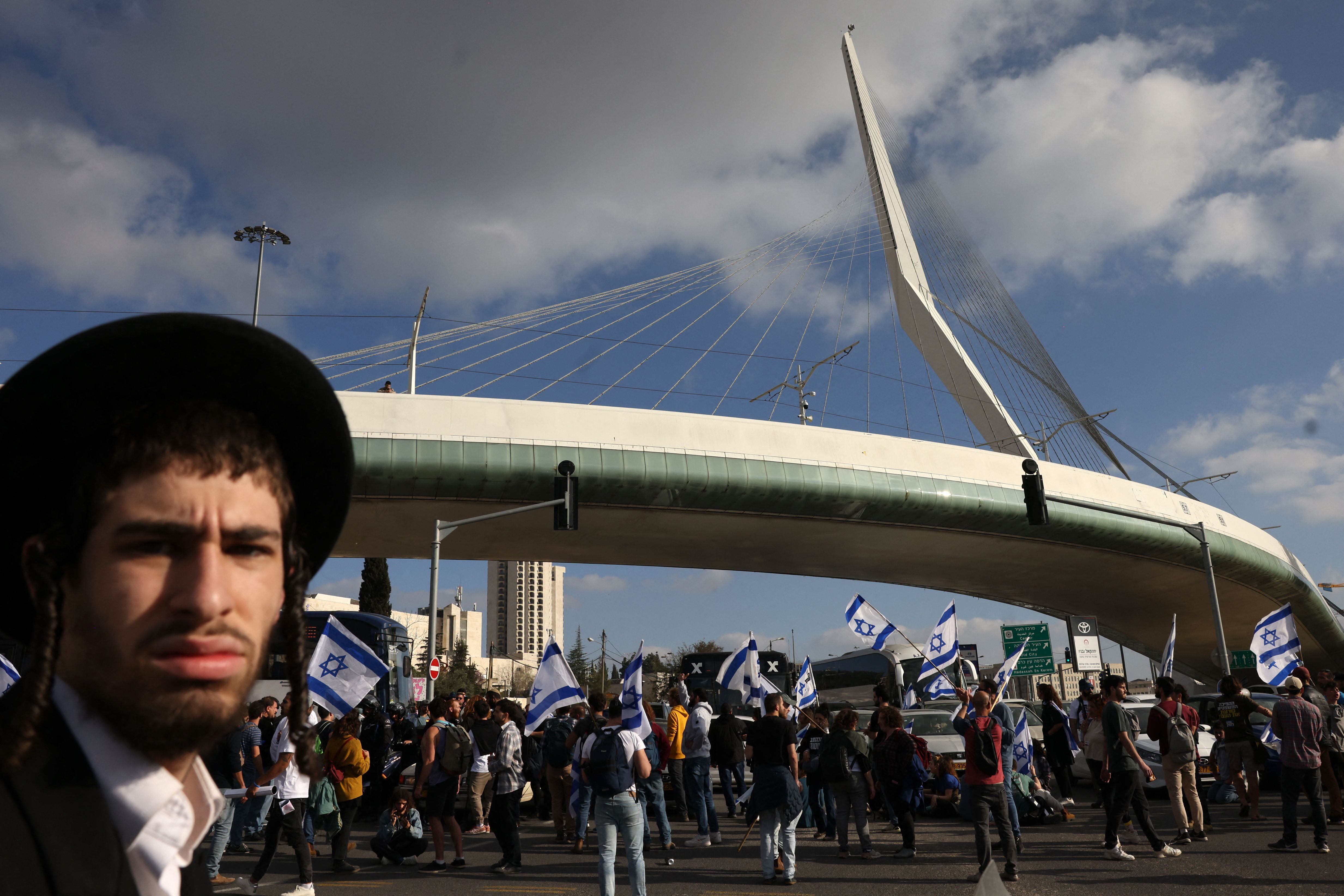 <p>Protesters gather outside Israel's parliament in Jerusalem</p>