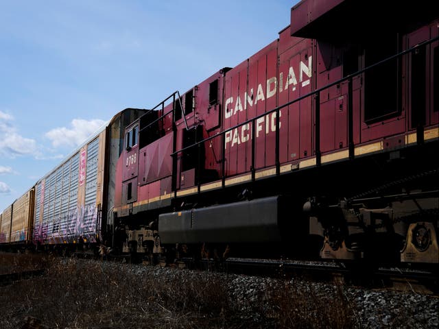 <p>Canadian Pacific trains sit at the main CP Rail train yard in Toronto, March 21, 2022. The first major railroad merger since the 1990s could be approved Wednesday, March 15, 2023, when federal regulators announce their decision on Canadian Pacific's $31 billion acquisition of Kansas City Southern railroad. (Nathan Denette/The Canadian Press via AP)</p>