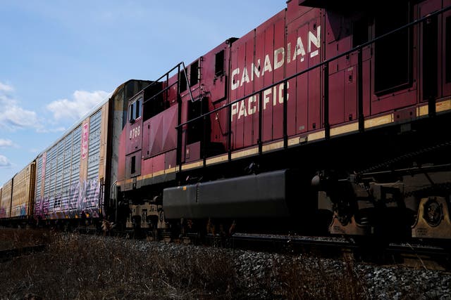 <p>Canadian Pacific trains sit at the main CP Rail train yard in Toronto, March 21, 2022. The first major railroad merger since the 1990s could be approved Wednesday, March 15, 2023, when federal regulators announce their decision on Canadian Pacific's $31 billion acquisition of Kansas City Southern railroad. (Nathan Denette/The Canadian Press via AP)</p>
