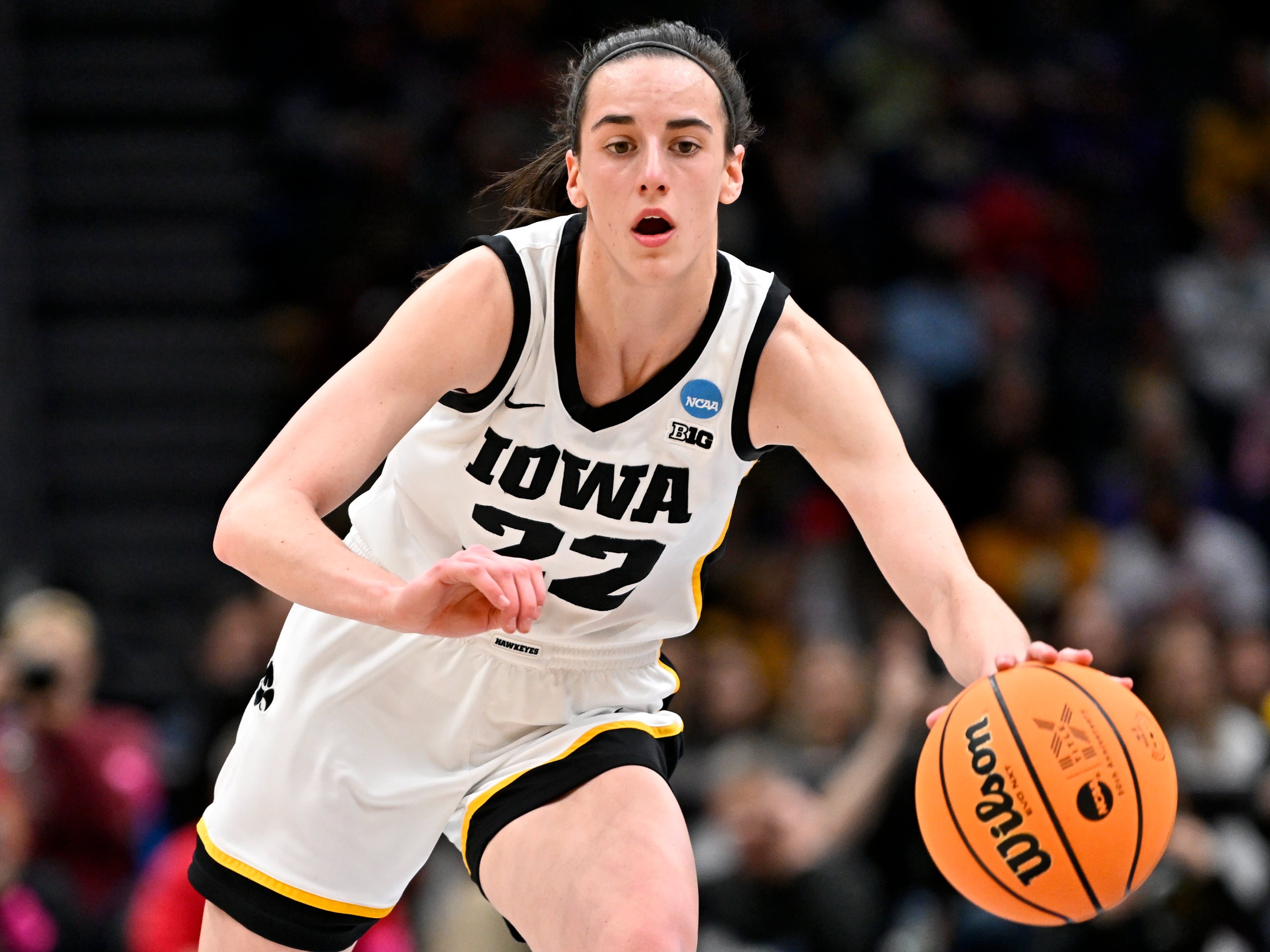 Iowa womens basketball player Caitlin Clark hailed as electrifying after making NCAA history The Independent image image