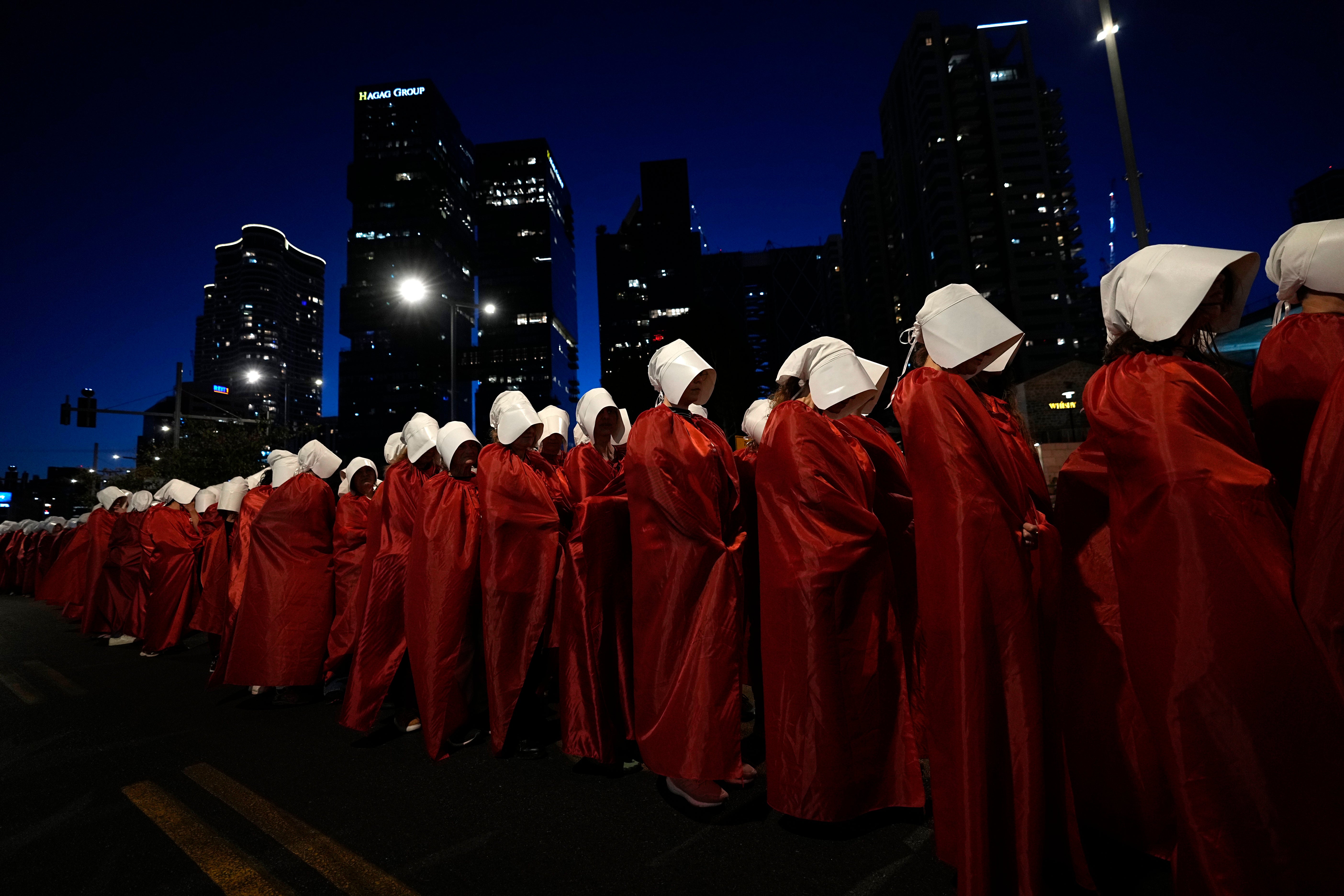 Israeli women's rights activists dressed as characters in the popular television series, "The Handmaid's Tale"