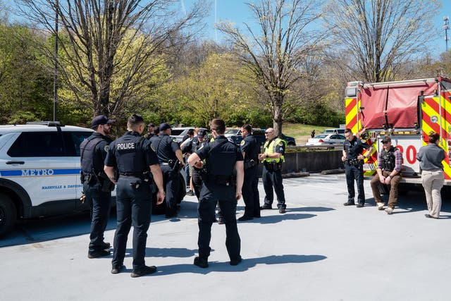 <p>Metro Nashville Police Department and officials on the scene outside the Covenant School, Covenant Presbyterian Church, following a shooting in Nashville, Tennessee, USA, 27 March 2023</p>