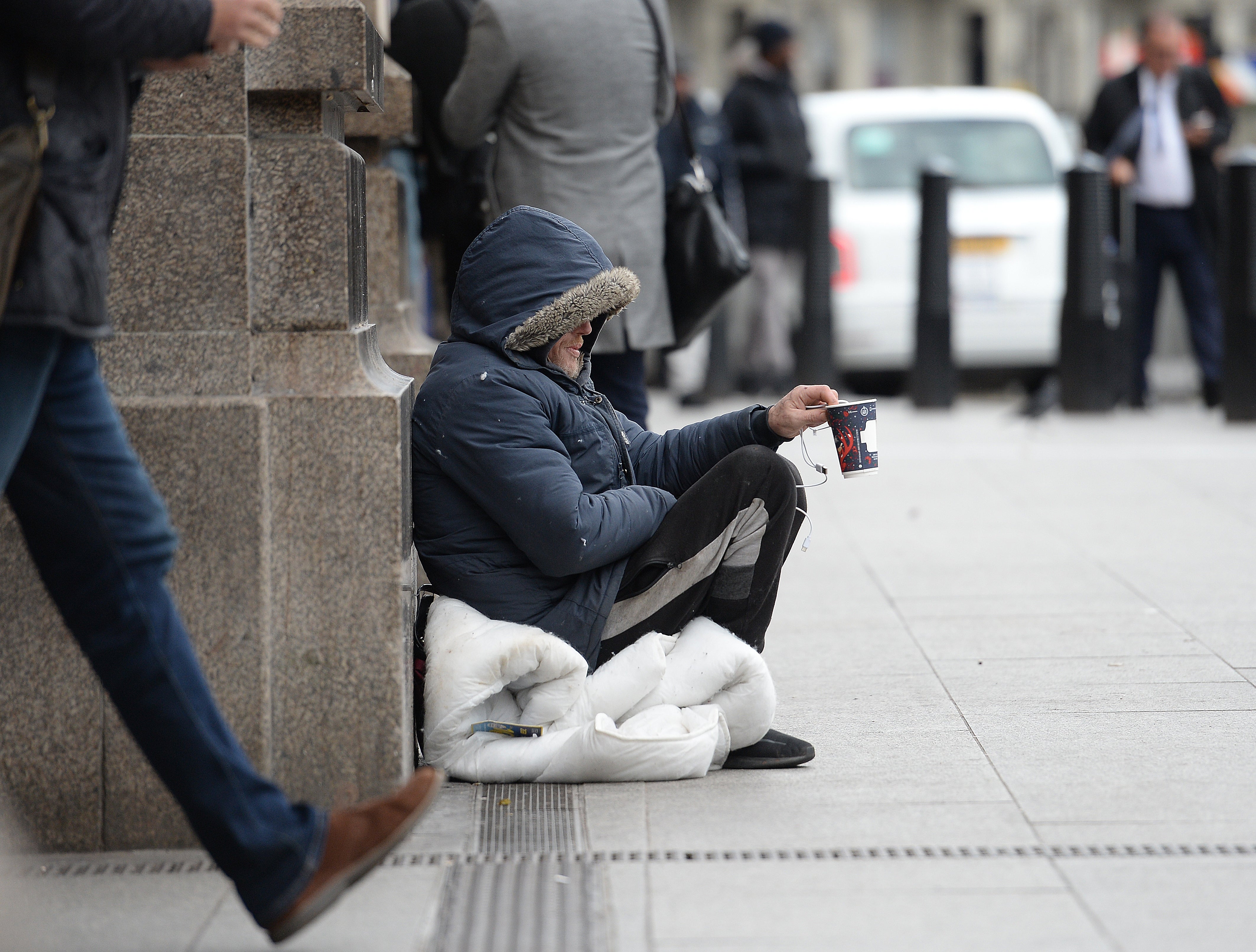 The government has announced new powers enabling police and local authorities to order beggars to move on