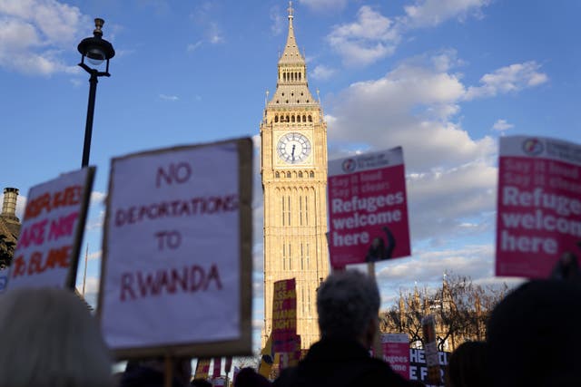 Demonstrators protesting against the Illegal Migration Bill in Parliament Square, London (Kirsty O’Connor/PA)