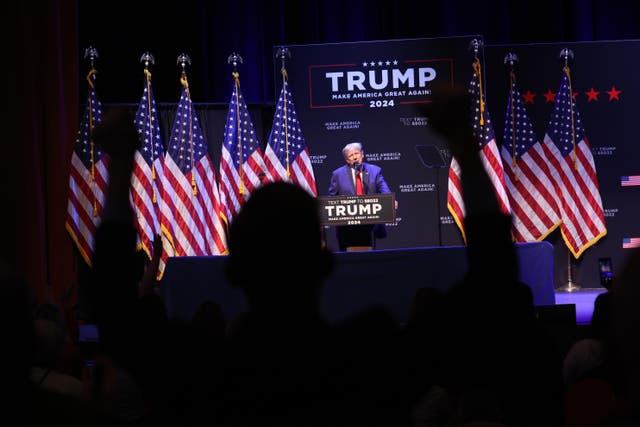 <p>Donald Trump speaks at the Adler Theatre on 13 March 2023 in Davenport, Iowa</p>