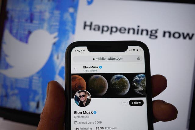 Twitter is set to scrap blue tick verification marks for users who do not pay a monthly fee, according to new rules shared by billionaire owner Elon Musk (Yui Mok/PA)