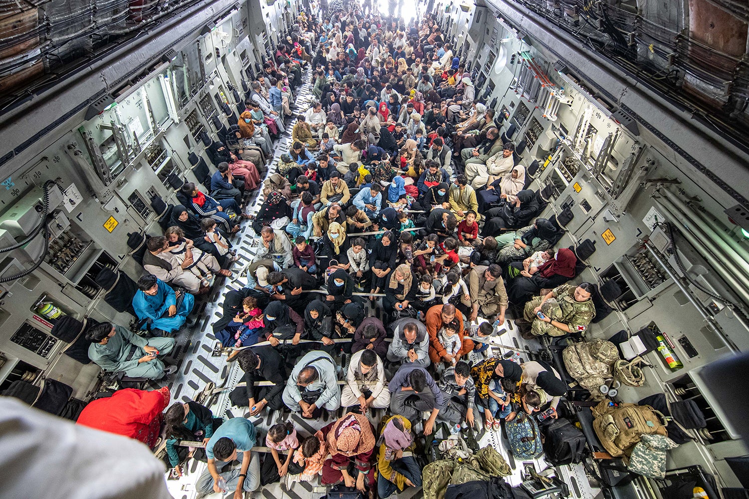 Evacuees on a flight from Kabul in August 2021