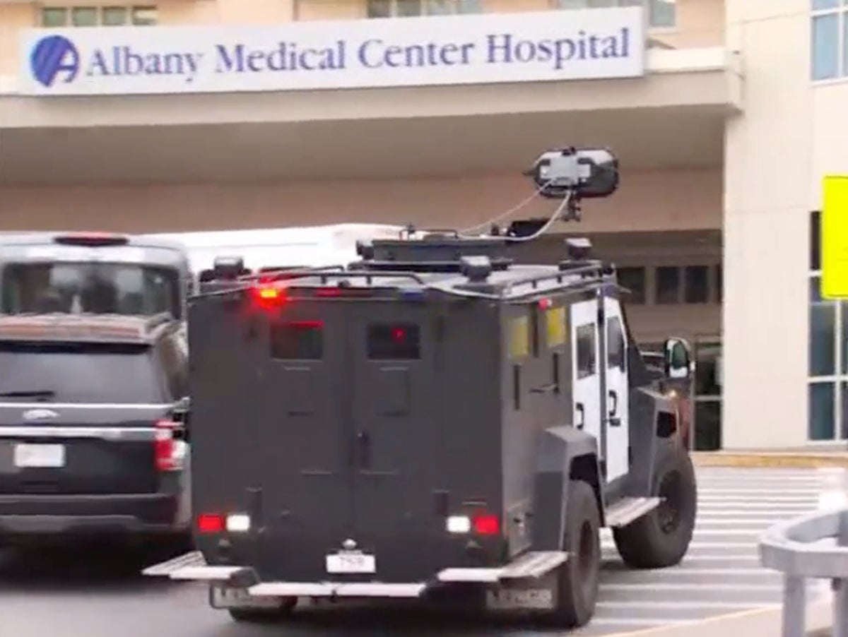 Man in custody after barricading himself with gun and elderly mother in hospital room