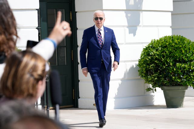 <p>President Joe Biden walks out of the White House in Washington and talks with reporters before boarding Marine One on the South Lawn, Tuesday, March 28, 2023. Biden is heading to North Carolina to visit an expanding semiconductor manufacturer. (AP Photo/Susan Walsh)</p>