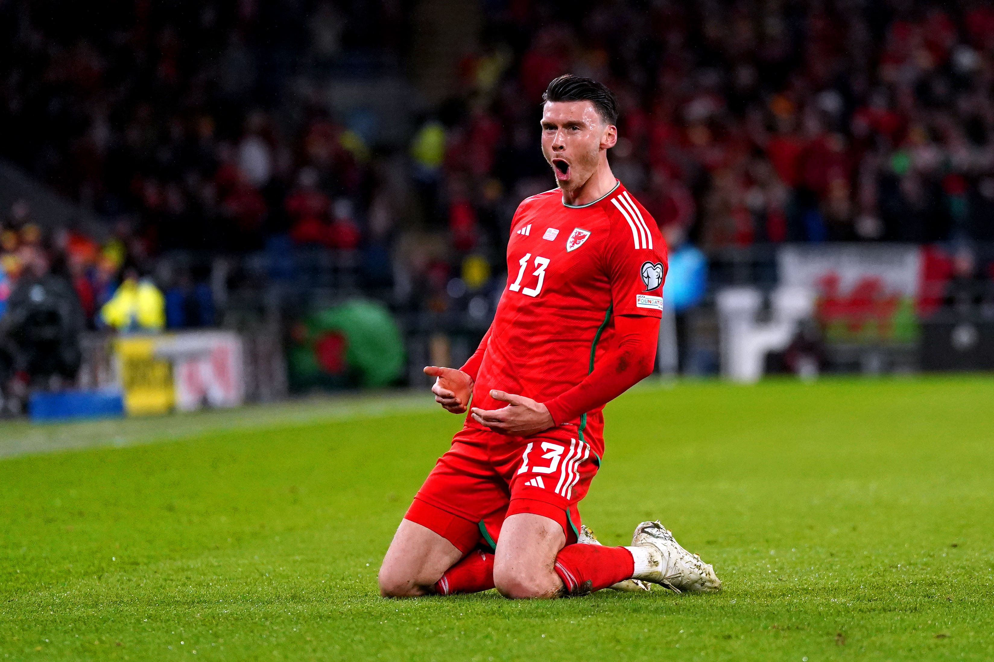 Kieffer Moore celebrates scoring Wales’ winner in their Euro 2024 qualifier against Latvia (Nick Potts/PA)