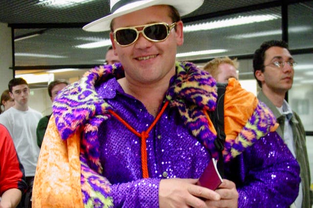<p>Lonesome tonight? Elvis impersonator in the passport queue at Amsterdam Schiphol airport</p>