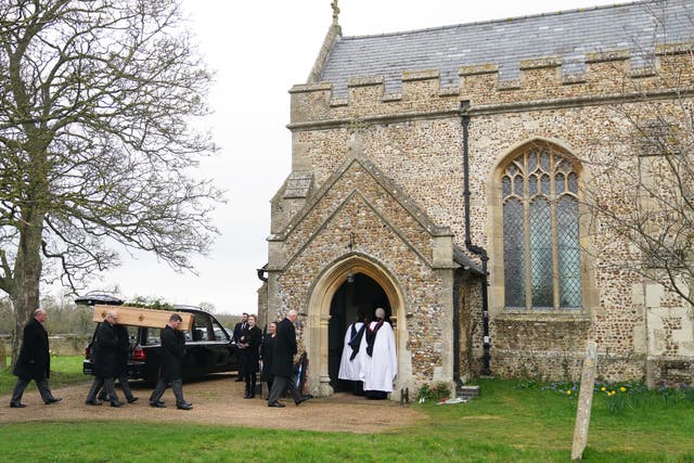 The coffin of former speaker of the House of Commons Betty Boothroyd is carried into St George’s Church, Thriplow, Cambridgeshire (Joe Giddens/PA)