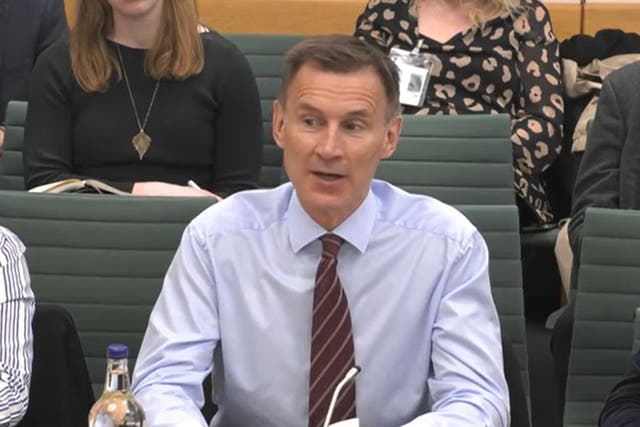 Chancellor Jeremy Hunt said during a Treasury Committee hearing that the UK must wait months for a green industrial strategy to match the US and EU (House of Commons/UK Parliament/PA)