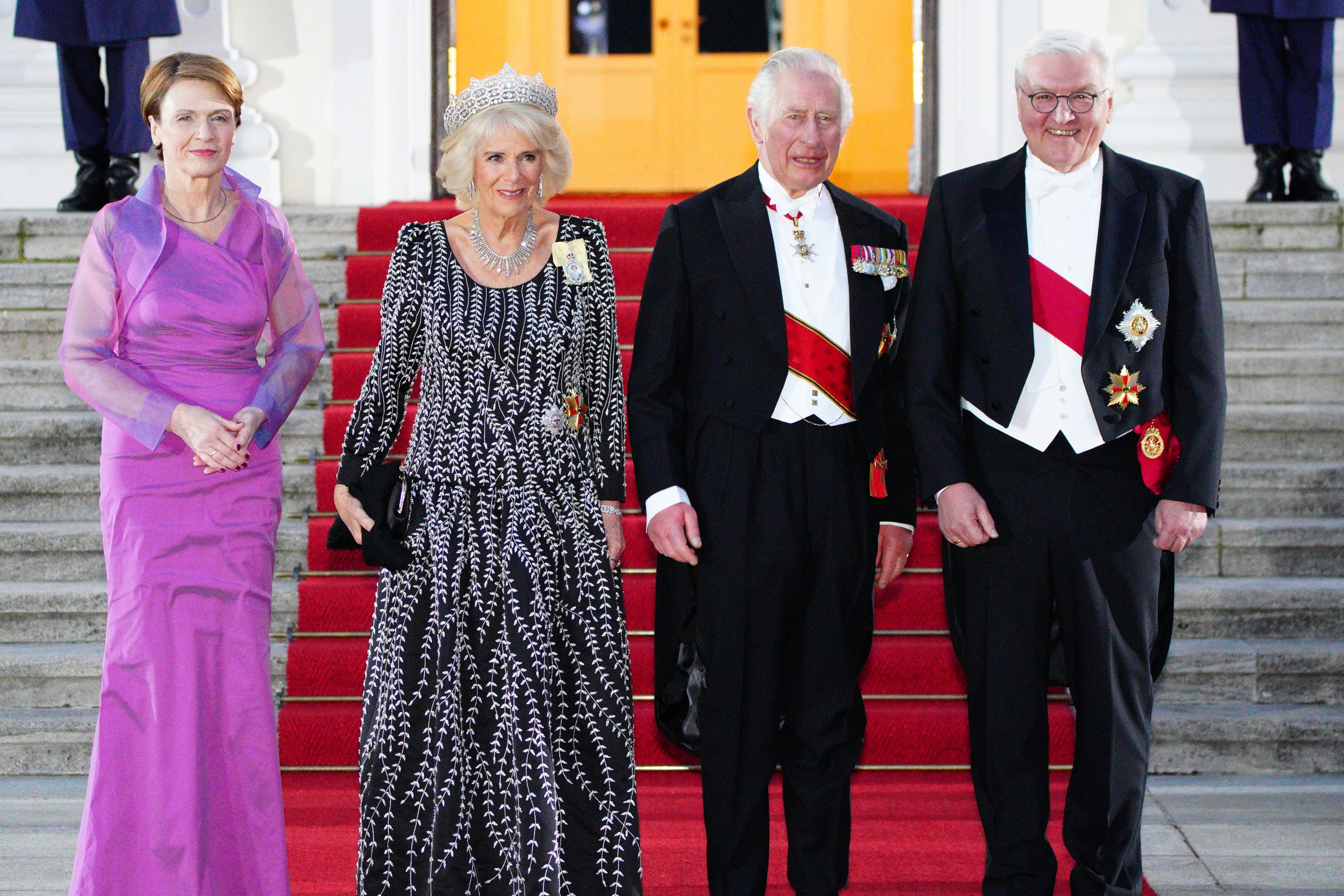 (left to right) Elke Budenbender, the Queen Consort, the King and German president Frank-Walter Steinmeier arrive at the state banquet at Bellevue Palace (Ben Birchall/PA)