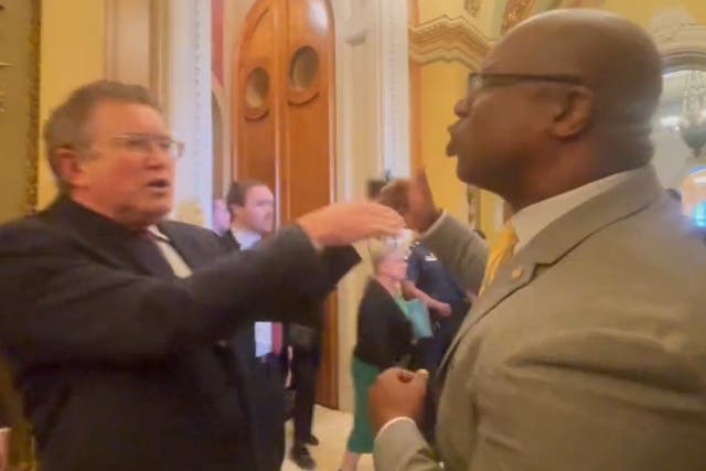 <p>US representatives Jamaal Bowman and Thomas Massie argue in front of reporters on 29 March 2023</p>