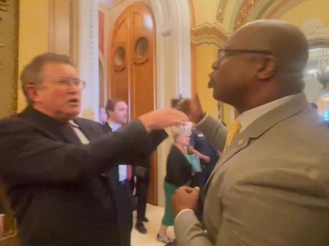 <p>US representatives Jamaal Bowman and Thomas Massie argue in front of reporters on 29 March 2023</p>