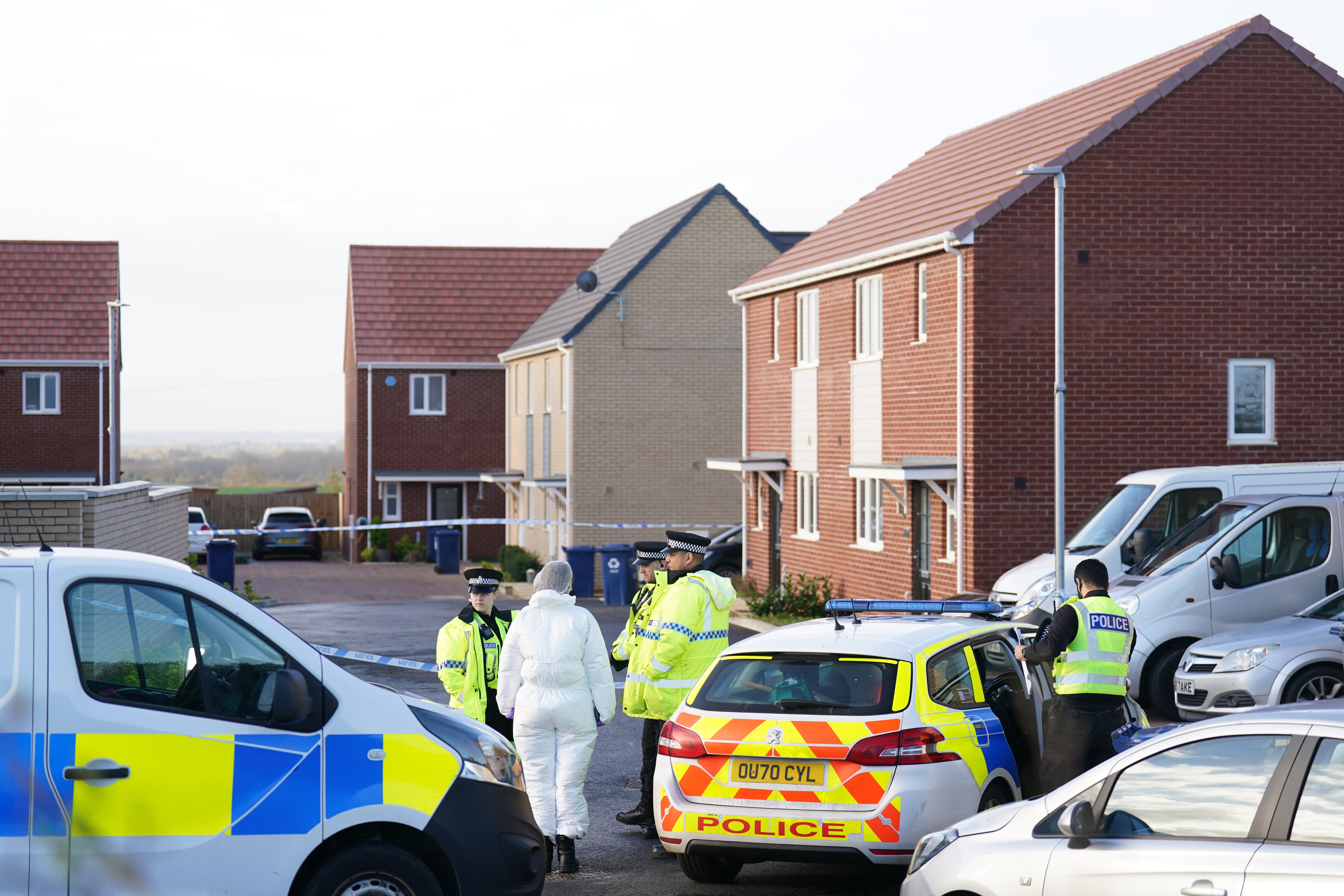 Police at the scene in Meridian Close, Bluntisham, Cambridgeshire, where police found the body of a 32-year-old man with a gunshot wound on Wednesday evening
