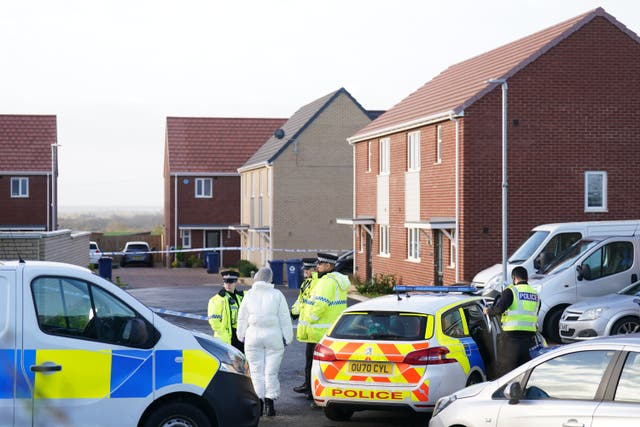 <p>Police at the scene in Meridian Close, Bluntisham, Cambridgeshire, where police found the body of a 32-year-old man with a gunshot wound on Wednesday evening</p>