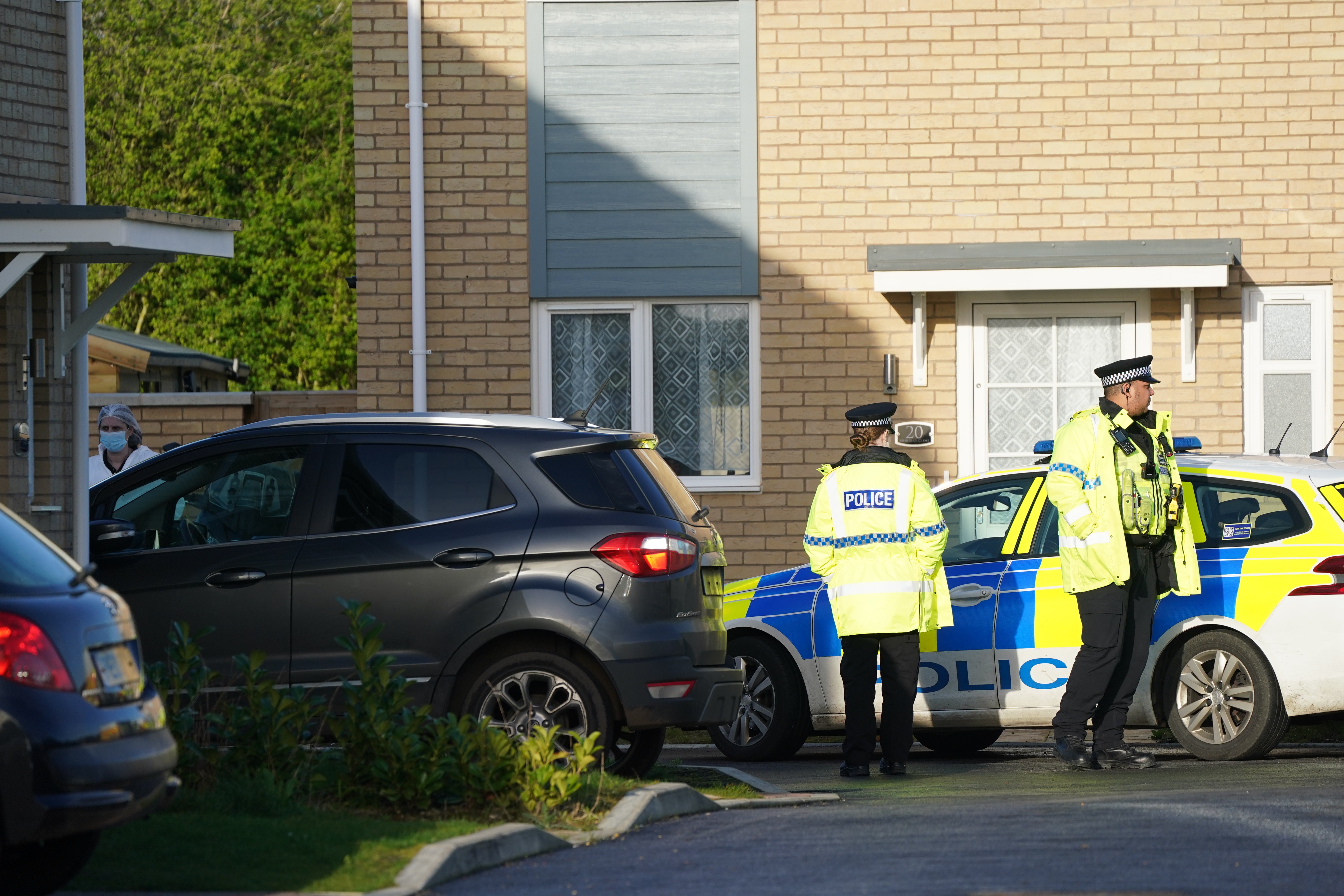 Police at the scene in Meridian Close, Bluntisham, Cambridgeshire, which has been cordoned off