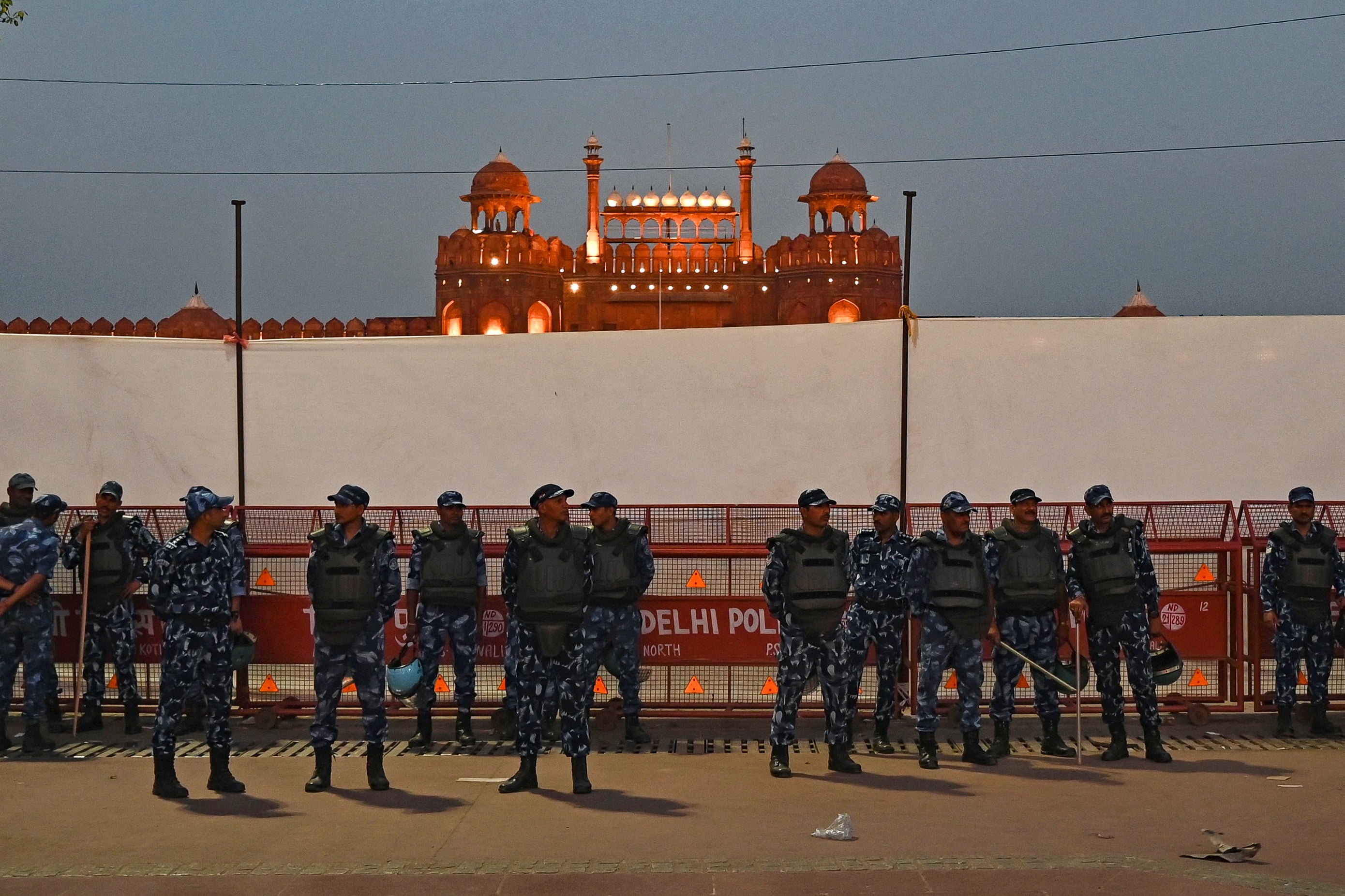 Rapid Action Force (RAF) personnel stand guard infront of the Red Fort during a protest march by India’s Congress party against conviction of Congress party leader Rahul Gandhi in a criminal defamation case, in New Delhi on 28 March 2023