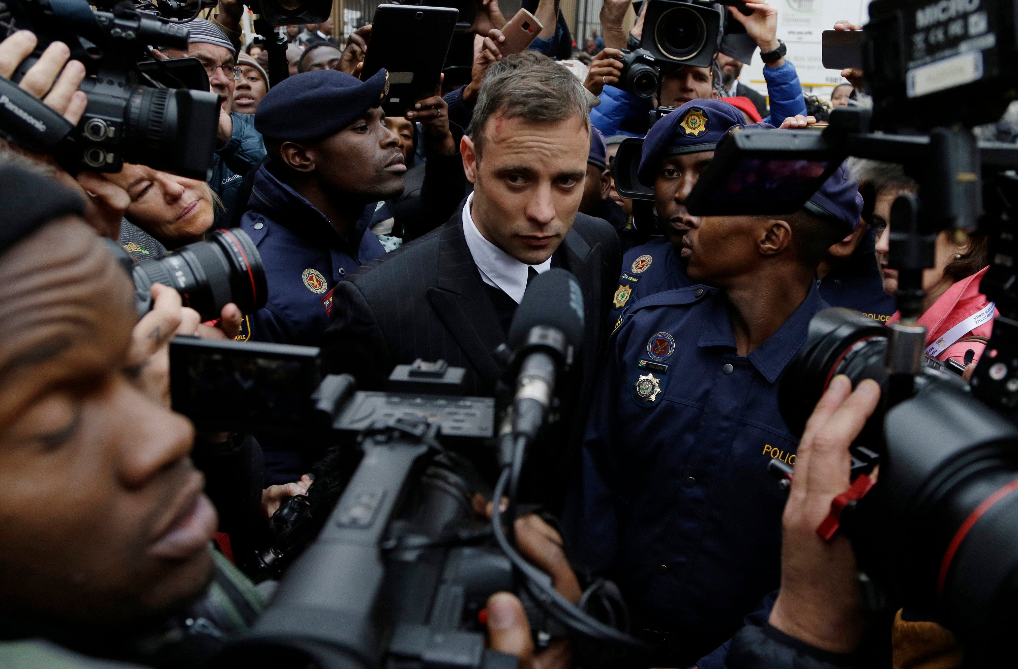 Pistorius leaves the High Court in Pretoria, South Africa, during his 2016 trial for the murder of his girlfriend Reeva Steenkamp