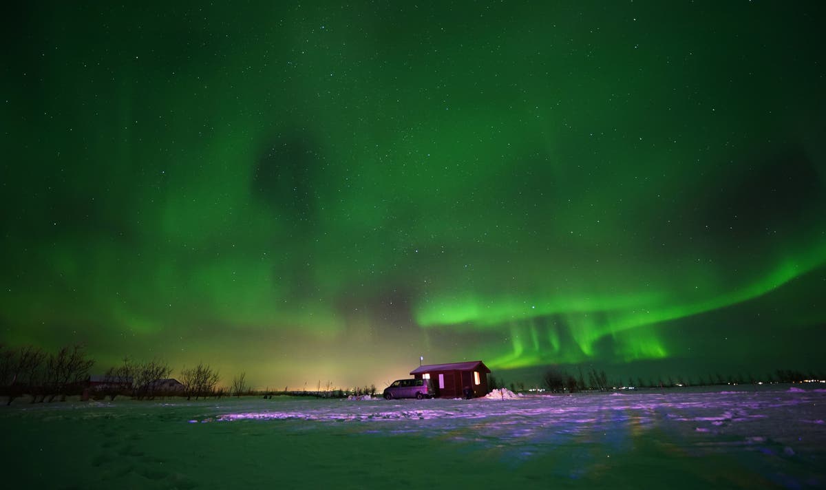 New Zealand skies explode with striking green and pink southern lights
