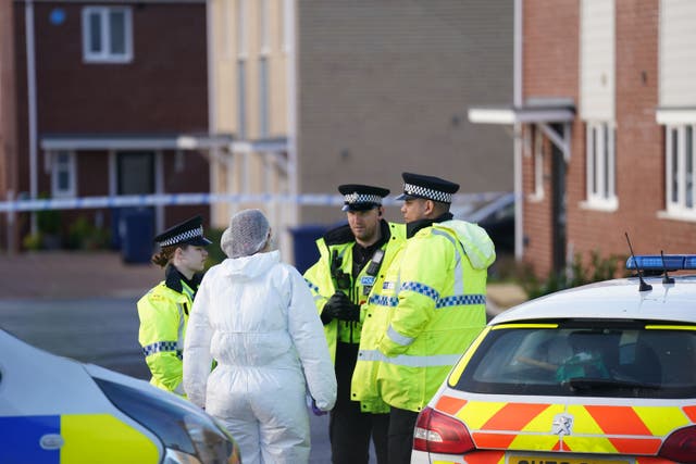 <p>Police and forensics at the scene in Meridian Close, Bluntisham, Cambridgeshire, where police found the body of a 32-year-old man with a gunshot wound on Wednesday evening </p>