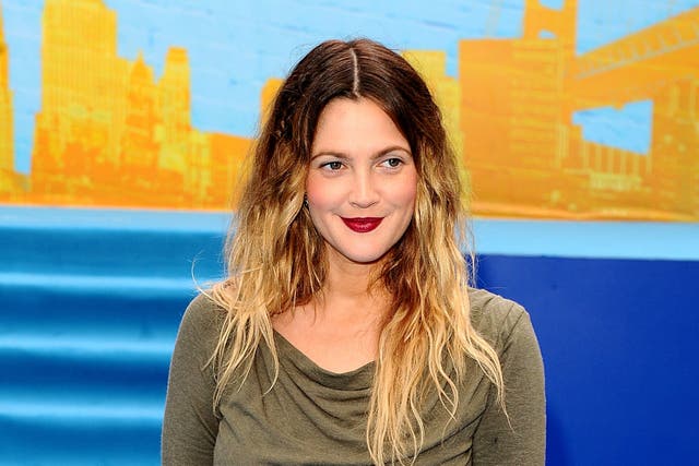 Drew Barrymore has been up front about the perimenopause (Ian West/PA)
