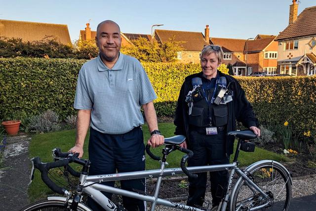 Nadeem Mughal is reunited with his tandem, with Cleveland Police PCSO Nic Clerc (Cleveland Police/PA)
