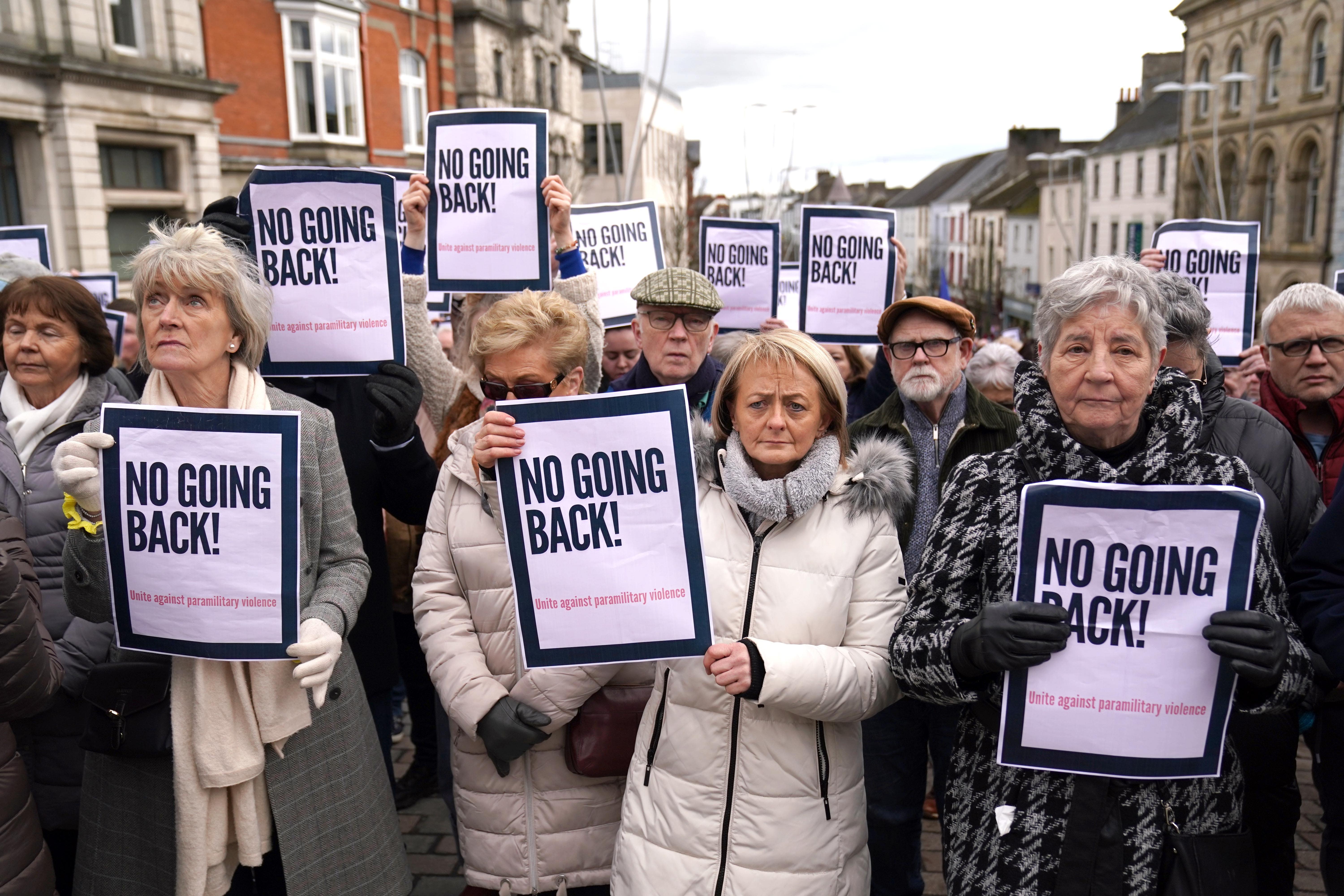 People taking part in a rally outside Omagh Courthouse to unite against paramilitary violence (PA)