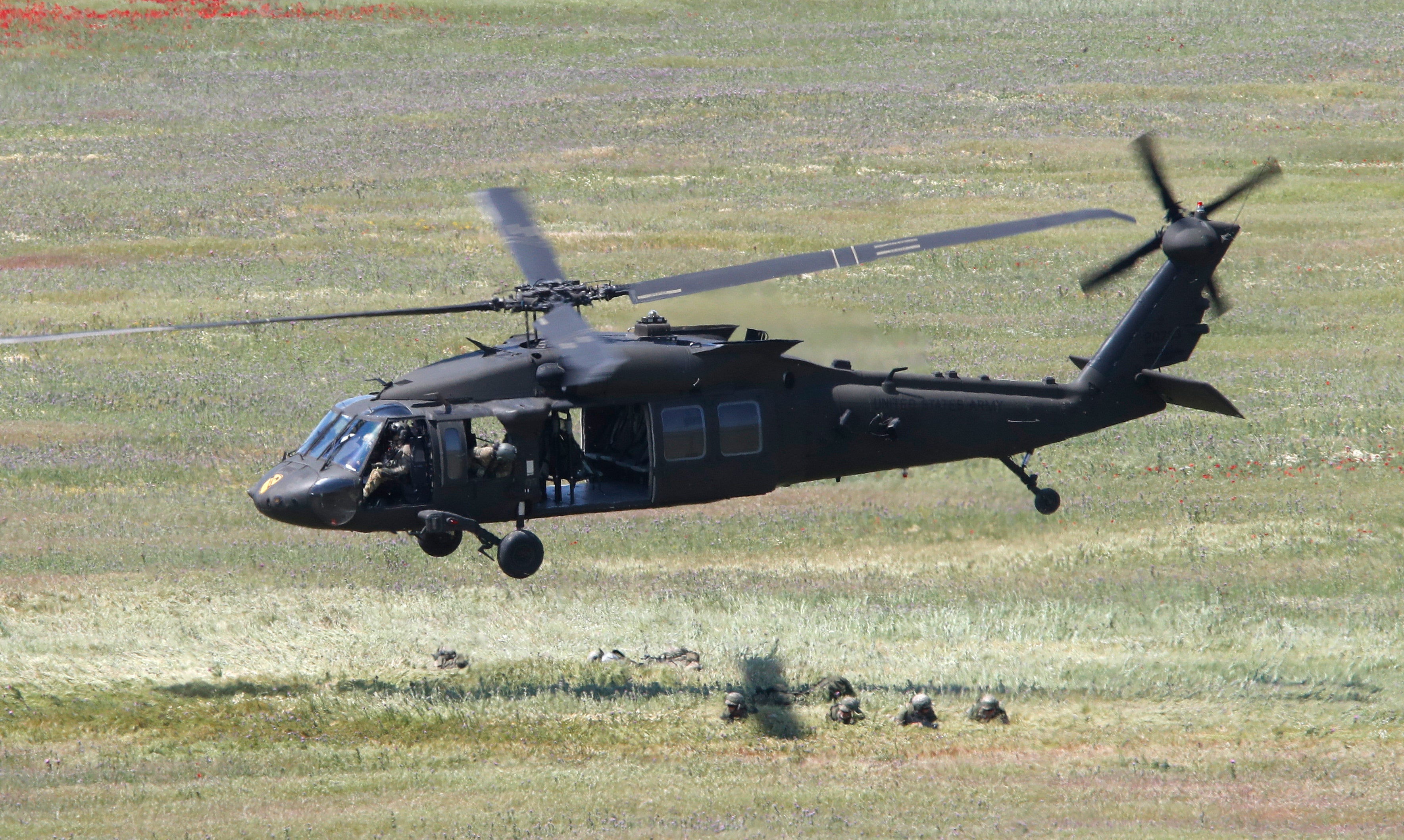 A US Black Hawk helicopter takes off after deploying soldiers during the Swift Response 22 military exercise in 2022