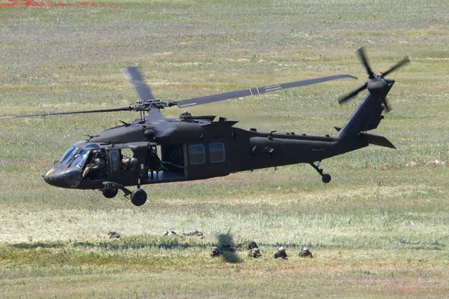 <p>A US Black Hawk helicopter takes off after deploying soldiers during the Swift Response 22 military exercise in 2022 </p>
