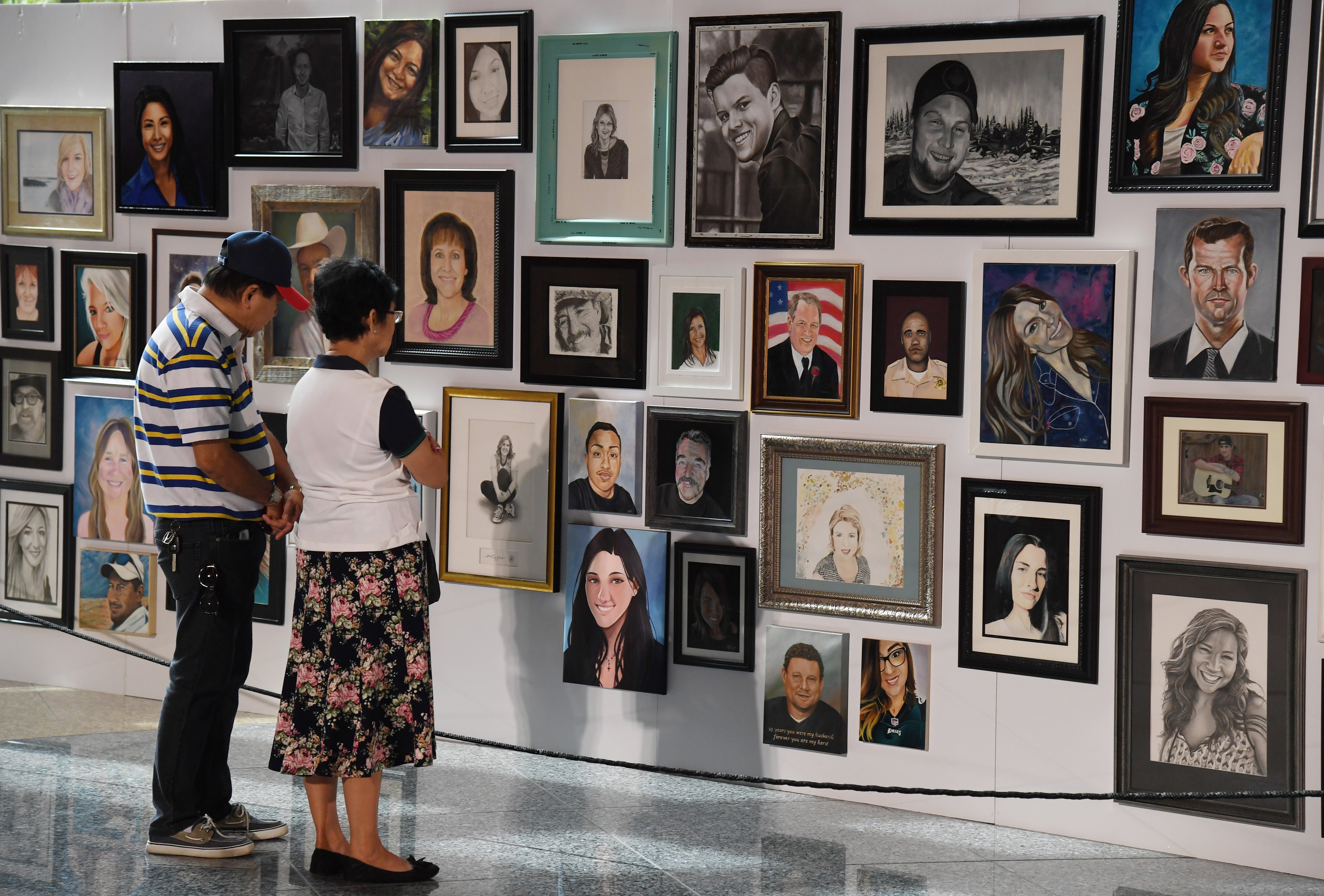 Portraits of vctims of the Las Vegas mass shooting at the Clark County Government Center in 2018