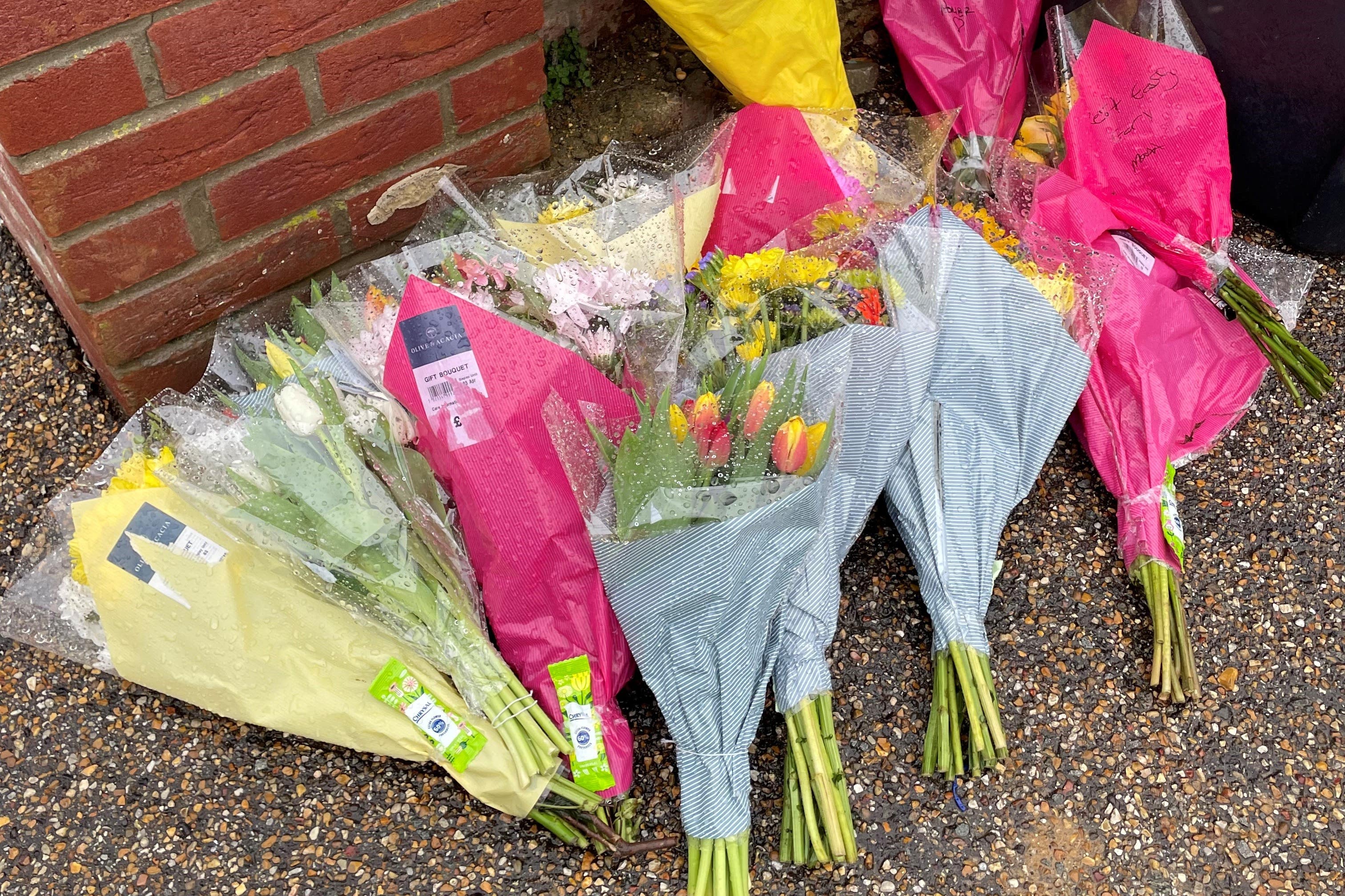 Floral tributes left outside the home of Gary Dunmore
