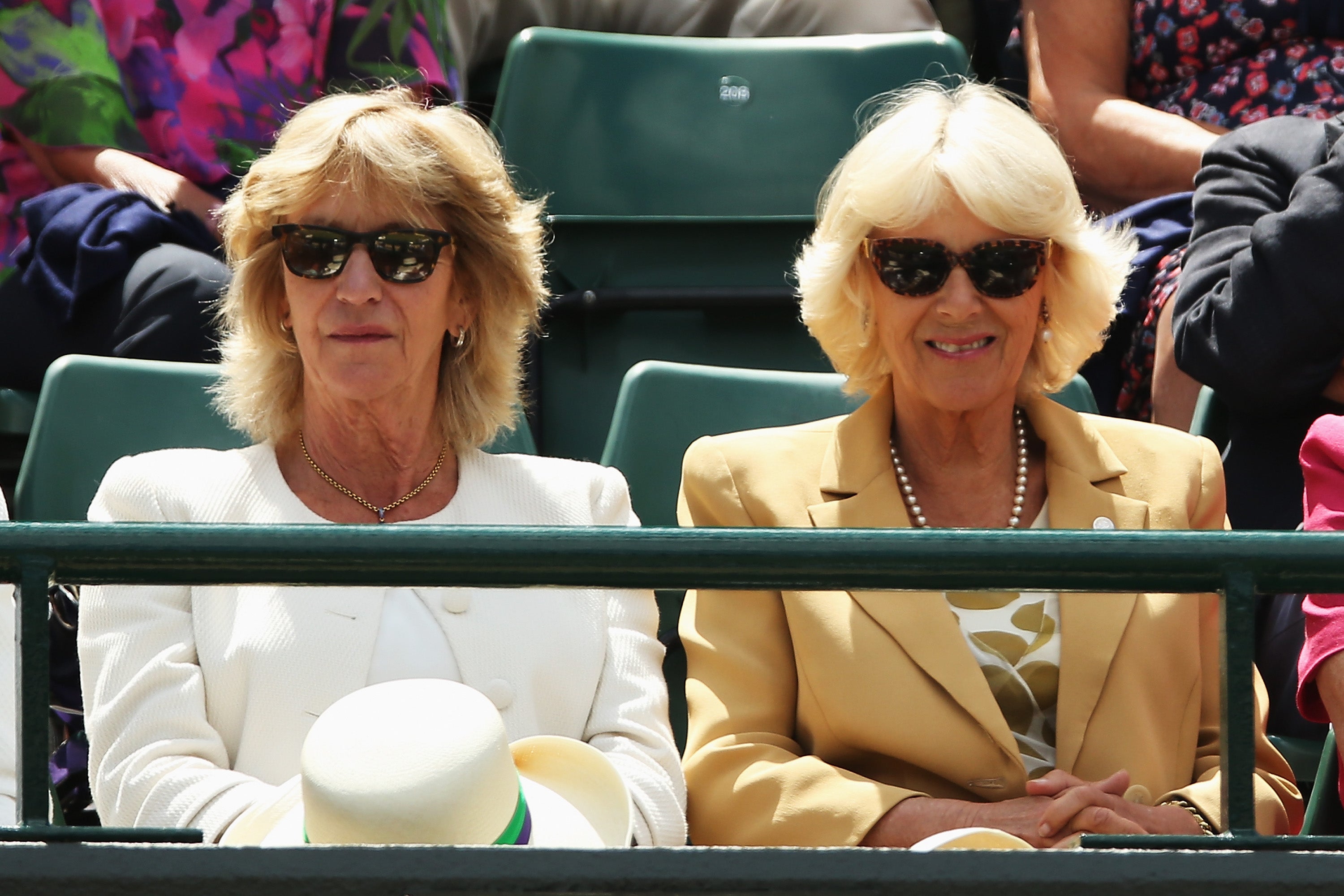 Camilla, Duchess of Cornwall (r) and Annabel Elliot (l) on day three of the Wimbledon Lawn Tennis Championships at the All England Lawn Tennis and Croquet Club at Wimbledon on June 25, 2014
