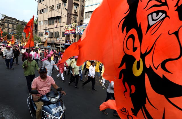 <p> Hindu devotees participate in a religious procession to celebrate the Ram Navami festival in Kolkata</p>