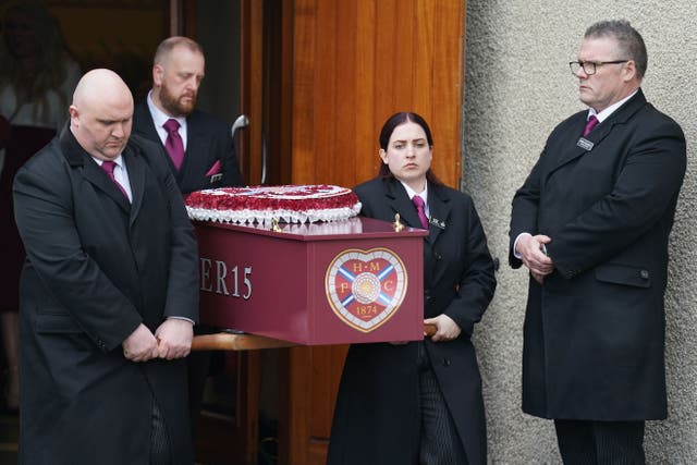 The coffin is carried from the church after the funeral of Andrew MacKinnon (Andrew Milligan/PA)