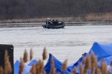 Child missing after migrant bodies found near Canada border