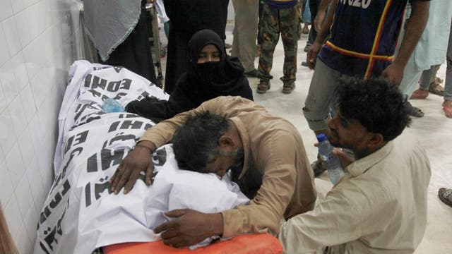 Stampede at food distribution center kills 11 in Pakistan | The Independent