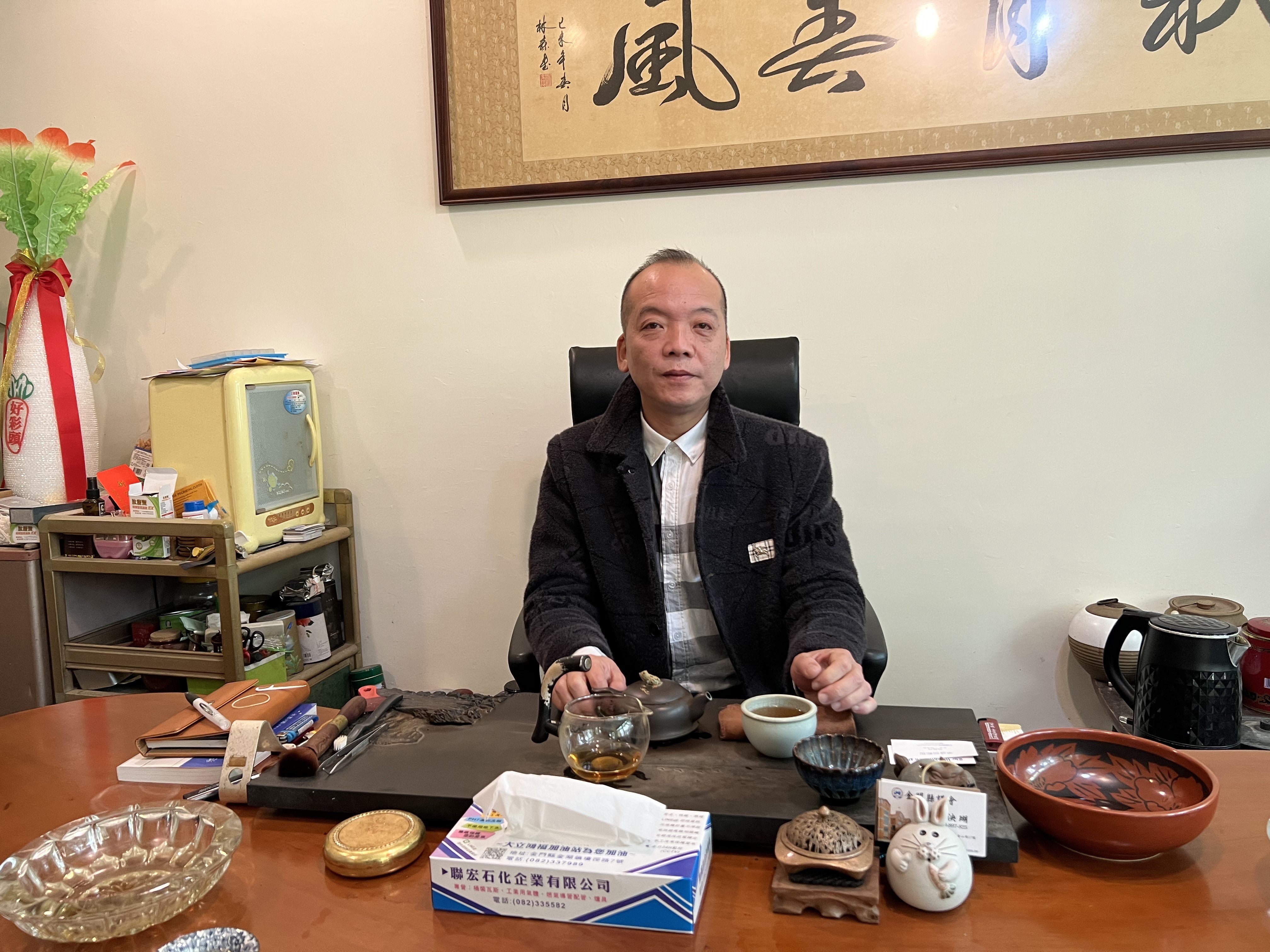 Yu Hong-lin poses at the state-owned Kinmen Kaoliang Liquor Inc’s campus