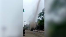 Tornado whips through steel plans as workers watch in amazement