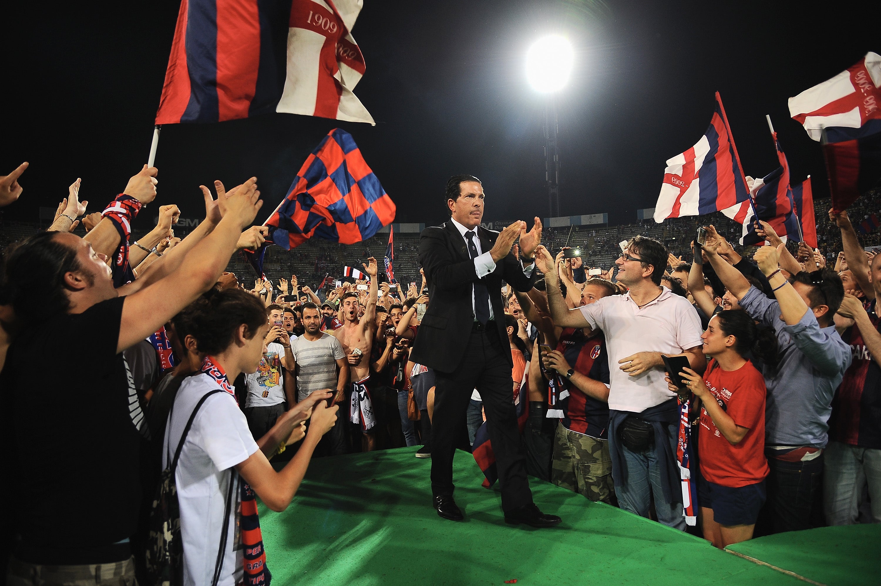 Tacopina, as president of Bologna FC, celebrates with supporters at the end of the Serie B play-off final match between Bologna FC and Pescara Calcio at Stadio Renato Dall’Ara on June 9, 2015