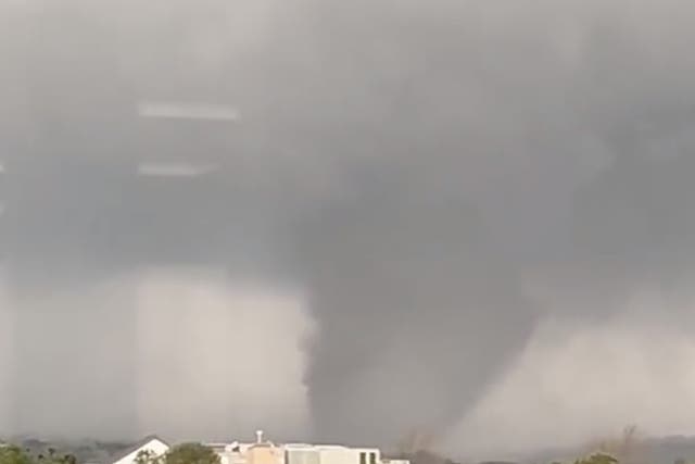 <p>A massive tornado tears across the Little Rock, Arkansas metro area on 31 March</p>