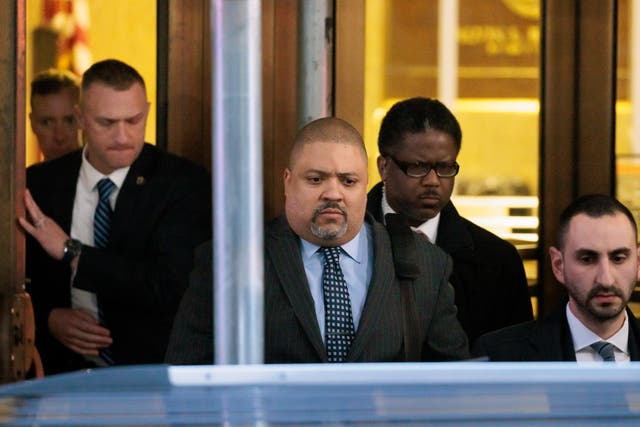 <p>Manhattan District Attorney Alvin Bragg leaves his office in New York on 30 March 2023</p>