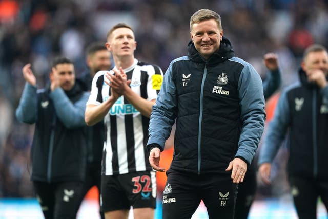Newcastle United manager Eddie Howe and players celebrate after the final whistle in the Premier League match at St. James’ Park, Newcastle. Picture date: Sunday April 2, 2023.